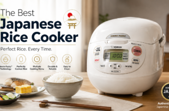 Zojirushi NS-ZCC10 Neuro Fuzzy Japanese Rice Cooker on a kitchen table next to a bowl of fluffy white rice and a traditional Japanese meal, featuring key benefits like Neuro Fuzzy technology and a Made in Japan authentic quality badge.